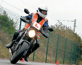 Motorcycle training rider cornering